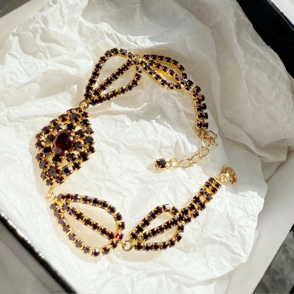 Vintage Garnet Rhinestone Bracelet – Gold Tone, Red Crystal Centerpiece